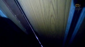 Лифт в сетчатой шахте