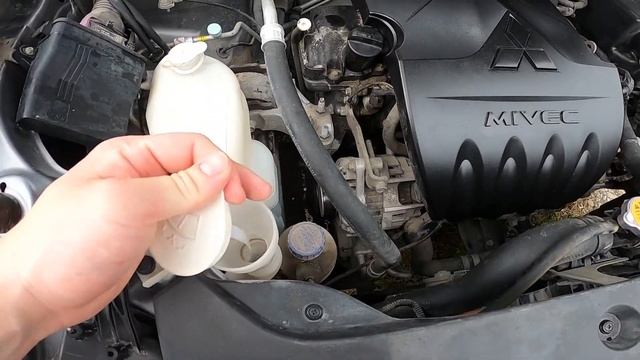 Where is the Washer Fluid Reservoir in Mitsubishi ASX I ( 2009 – 2017 ) смотреть онлайн