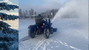 Обзор_работы_Снегоротор_передненавесной__на_Минитракторе_TZR_T-244XT.mp4