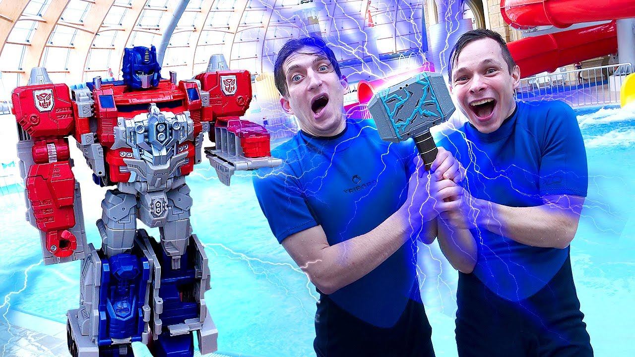 Роботы Трансформеры в Аквапарке Как остановить Молот ТОРА? Акватим и Оптимус в видео игре битве смотреть онлайн