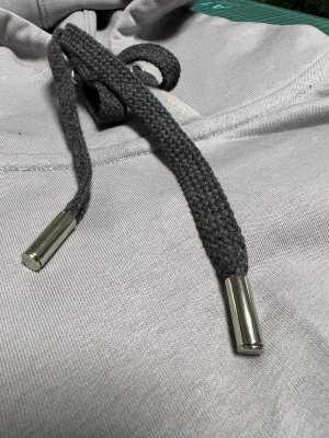 Установка наконечников на шнур капюшона mp4