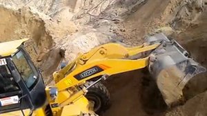 Работа фронтального погрузчика