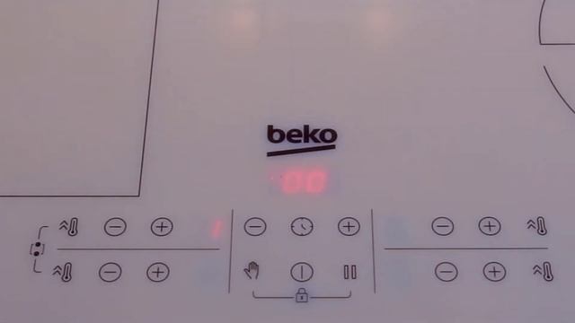Демонстрация сенсорной панели управления индукционной варочной поверхности Beko HII 64200 FMTW смотреть онлайн