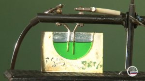 20. Электричество. Втягивание жидкого диэлектрика в конденсатор