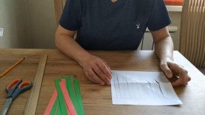 Плетёный коврик из цветной бумаги