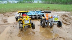 Самосвалы возят деревянные прутики