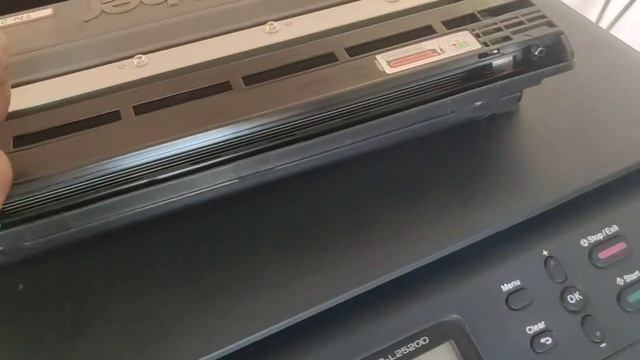 Slide the Green Tab on Drum Unit: Brother printer. How to solve this problem DCP-L2520D смотреть онлайн