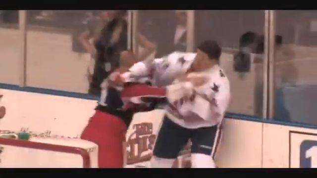 Hockeyfighters.cz  Steve MacIntyre Vs Jon 'Nasty' Mirasty.wmv