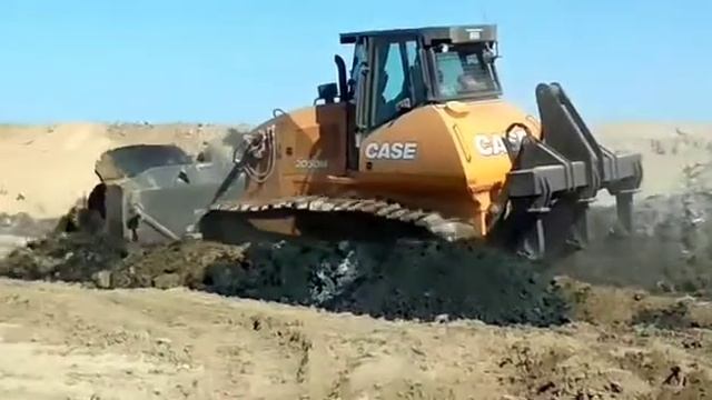 Бульдозер CASE 2050M за работой в Архангельской области, в группе компаний "ТИТАН" смотреть онлайн