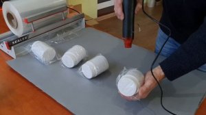 Упаковка в ПОФ плёнку с помощью ручного запайщика iSealer