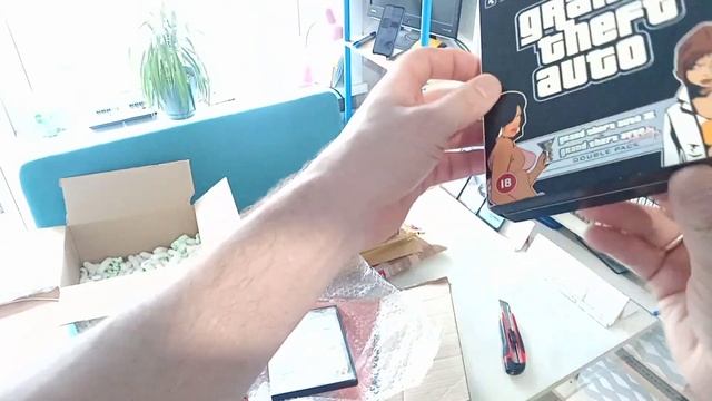 Распаковываем посылку с видеоиграми Sony PS2 от / Sony PS2 gamestore смотреть онлайн