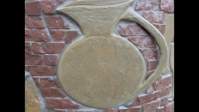 Укладка природнього каменю .Оздоблення криниці.