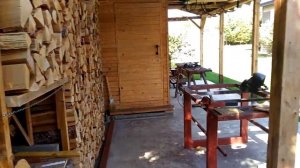 Навес с дровником и мастерской.