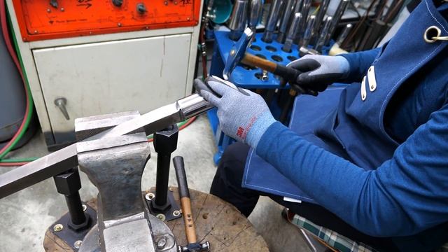 The Process Of Making A Metal Cup By Beating With A Hammer. A Master Of Korean Metal Crafts.