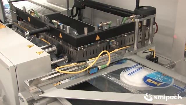 Пакверк: Smipack FP6000 автомат. Групповая упаковка пластиковой посуды в термоусадочную ПОФ пленку. смотреть онлайн