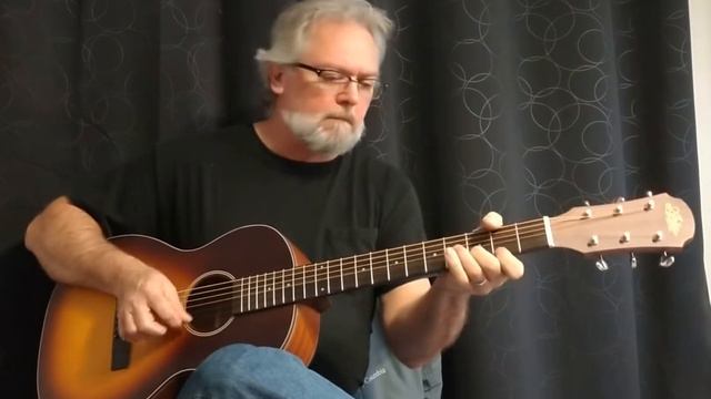 Tim Wallis demo'n the Aria-131 parlor guitar смотреть онлайн