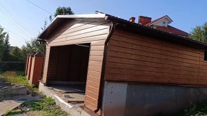 Гараж под ключ, металлокаркас обшитый металосайдингом.