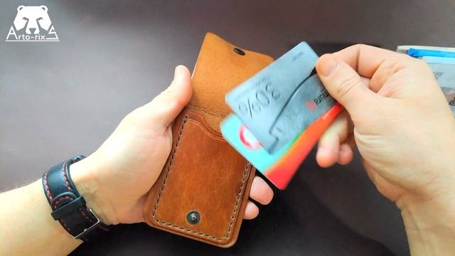 Минимализм и функциональность в ультратонком кошельке из высококачественной кожи. смотреть онлайн