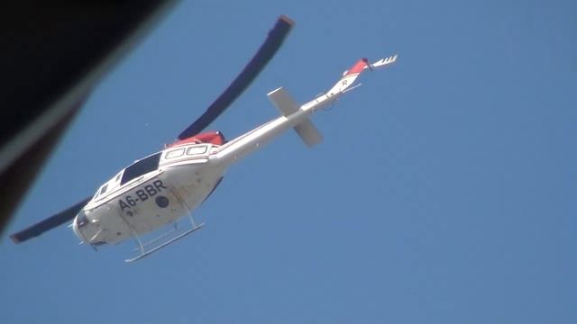 Sony HDR-XR150E - Helicopter zoomed in смотреть онлайн