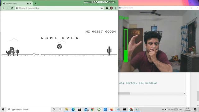 Playing Google Chrome Dinosaur Game using Hand Gesture in OpenCV and Python смотреть онлайн