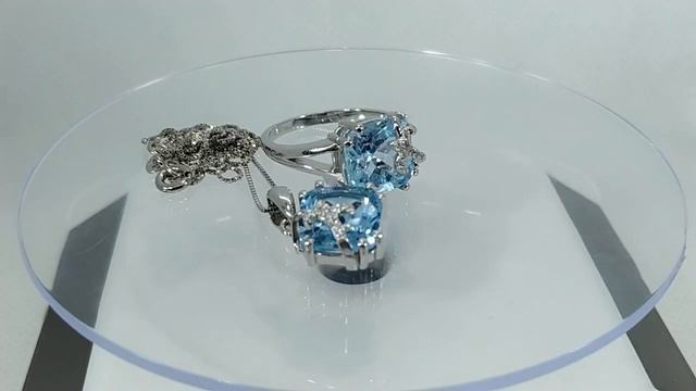 Кольцо и кулон с натуральным голубым (скай блю) топазом 10 мм в огранке кушон Флер-де-лис Серебро92