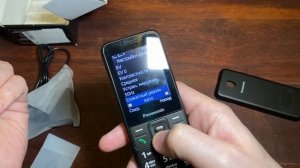 Распаковка и обзор на кнопочный телефон Panasonic KX-TF200RU.