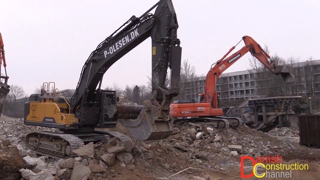 Volvo EC480E And 2x Doosan Excavators Working On A Demolition Site