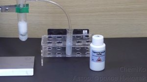 Взаимодействие углекислого газа с известковой водой (CO2 + Ca(OH)2 = CaCO3 + H2O)