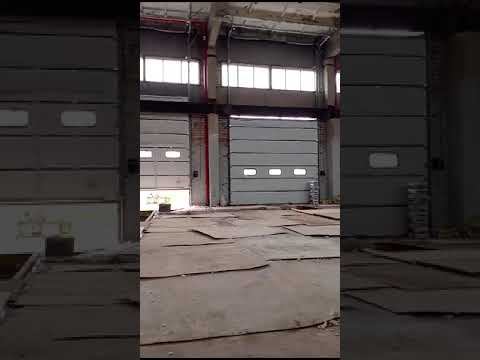 Промышленные секционные ворота Алютех со встроенными окнами смотреть онлайн