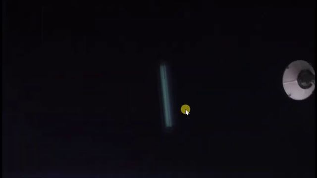 Long Green UFO Near Space Station In NASA Photo смотреть онлайн