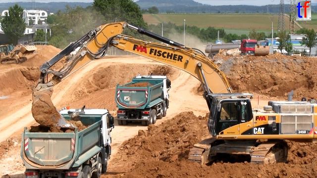 CATERPILLAR 345D L & MAN, Mercedes Dump Trucks / Fa. FWA Fischer, Waiblingen, Germany,  04.06.2014.