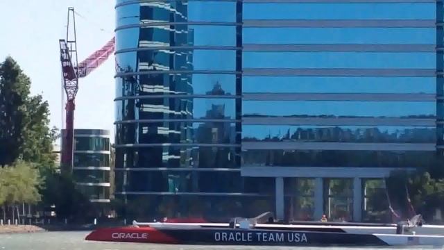More sky crane action of the Oracle Team USA race boat being delivered to the Oracle pond. смотреть онлайн