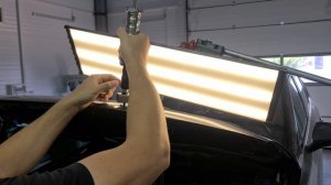 Удаление вмятины на алюминиевом капоте.