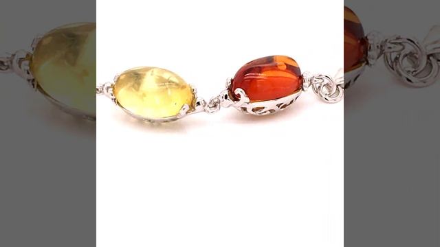 Браслет из родированного серебра с миксованным (коньячным, молочным) янтарем смотреть онлайн