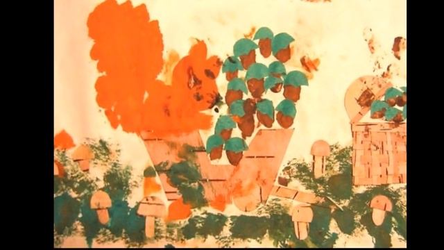 Сидит белка на тележке