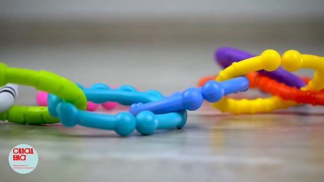 Погремушка Moo-ring