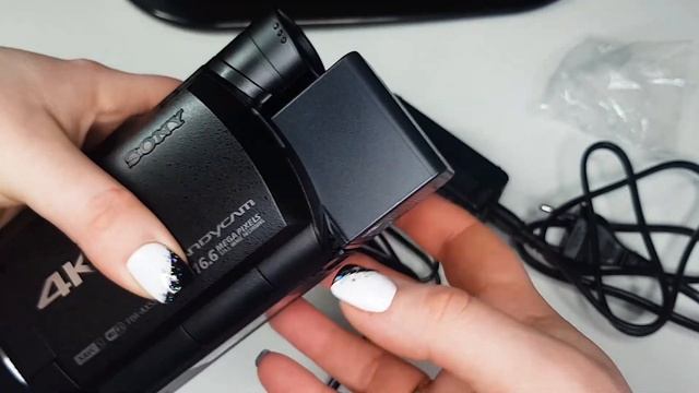 Распаковка Видеокамеры 4К Sony FDR-AX53 смотреть онлайн