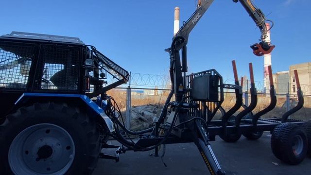 Трактор Беларус МУЛ 82.2 , лесовоз с гидроманипулятором смотреть онлайн