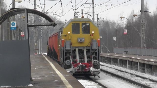 Тепловоз ЧМЭ3-1499 со снегоуборочной техникой смотреть онлайн