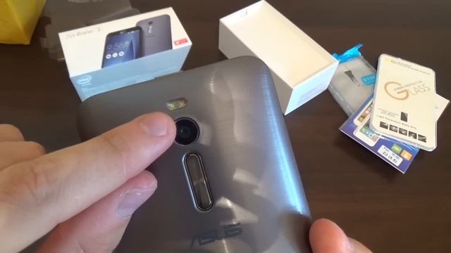Asus Zenfone 2. Открытие посылки с AliExpress смотреть онлайн