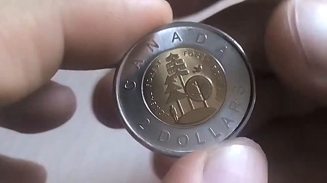 Биметаллические монеты Канада 2 доллара 2011 (170) Тайга - половина суши Канады смотреть онлайн