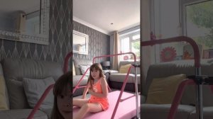 Doing gymnastics tricks on my gymnastics bar!