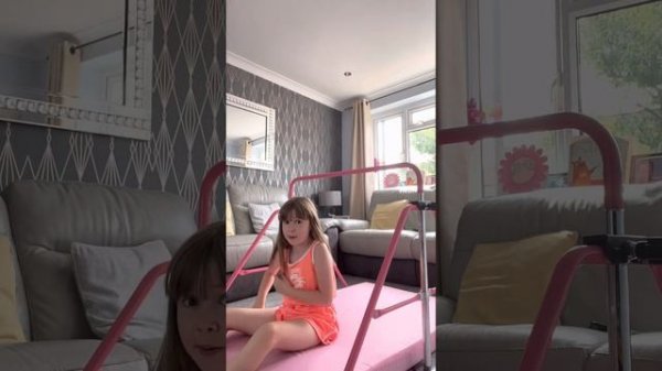 Doing gymnastics tricks on my gymnastics bar!