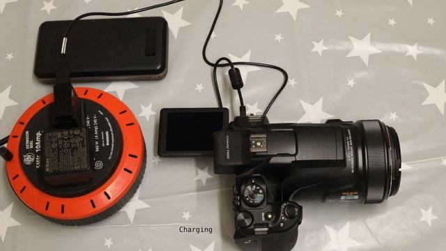 How to use a Nikon P1000 while charging it смотреть онлайн