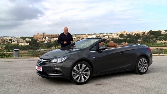 Opel Cascada and Kymco Xciting 400 Group Test смотреть онлайн