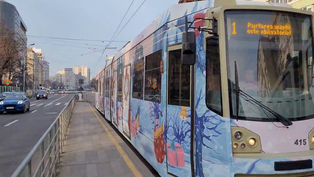 Tramvaiul Colindelor, Bucur LF-CA #415 intrând în Stația Pasaj Victoria, pe Linia 1 смотреть онлайн