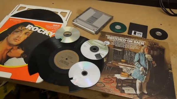 Electron microscope slow-motion video of vinyl LP [GuCdsyCWmt8]