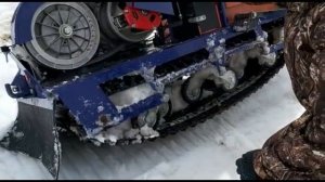 Мотобуксировщик по мокрому снегу и воде