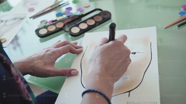 Make-up artist creates a make-up sketch on the face chart смотреть онлайн