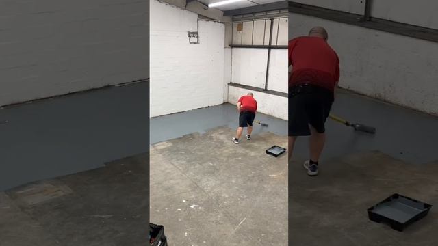 Workshop floor getting a fresh coat of paint
